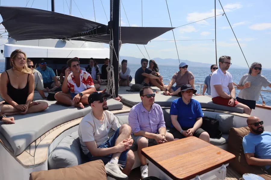 Matrix One colleagues on a boat deck off the coast of Athens